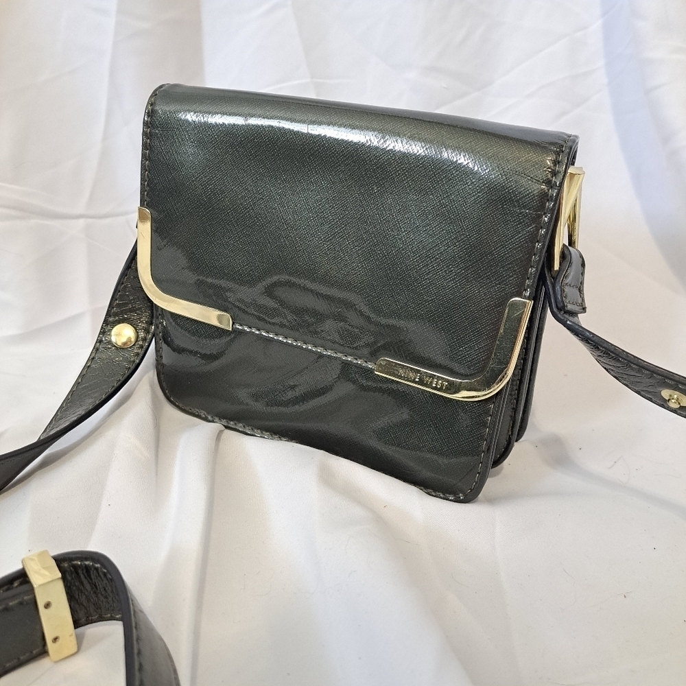 Nine West | Dark green mini purse with long strap & gold details